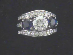 Brilliant Cut Diamond & Sapphire Ring in Platinum Mounting - $50K VALUE
